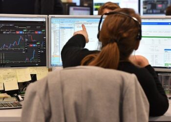 U.S., European shares advance as euro dives to lowest since 2017